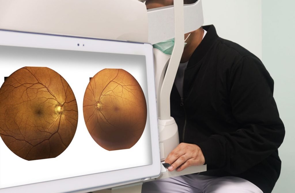 A man at his optometrist's office getting his eyes examined for diabetes and other health concerns